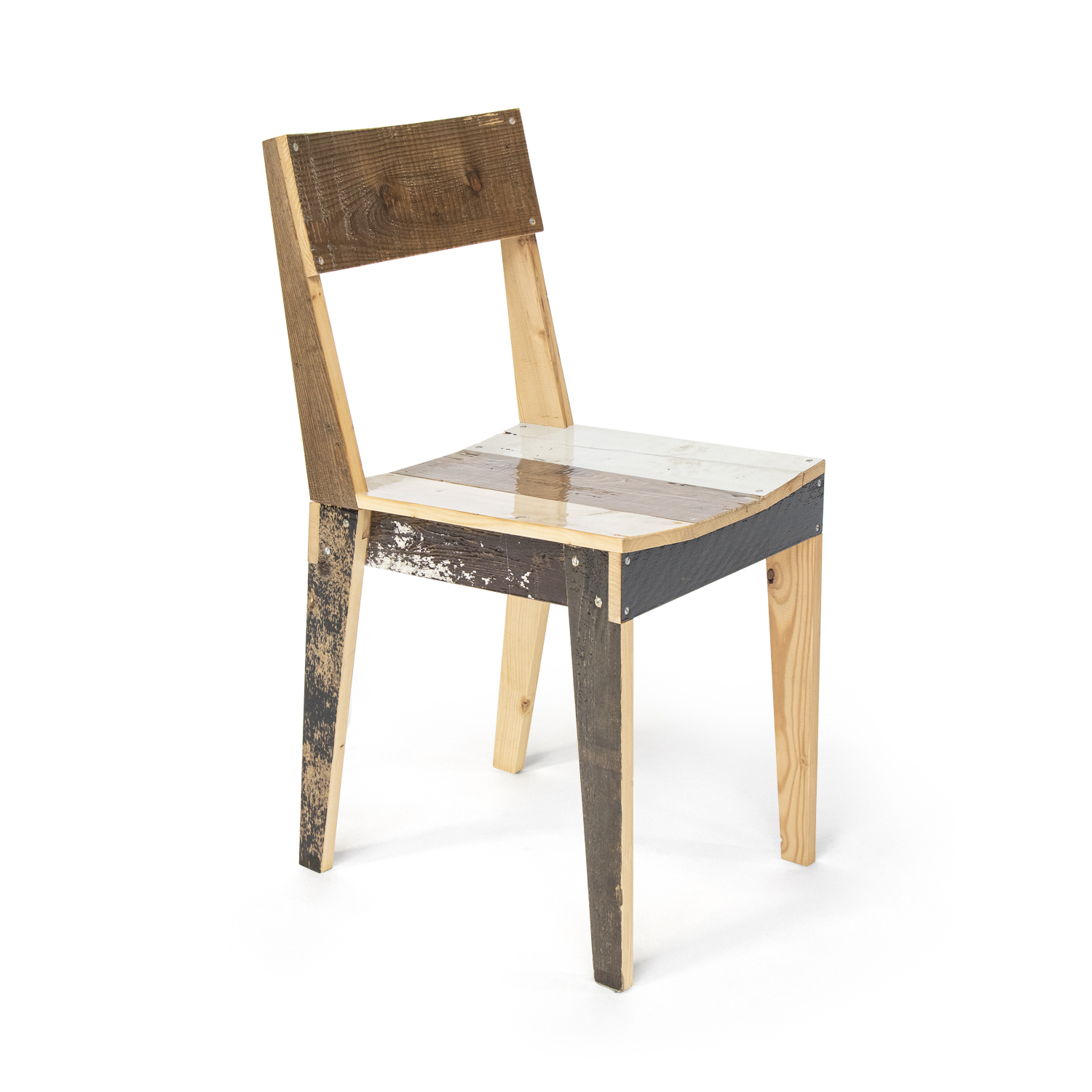 Piet Hein Eek's scrap-wood chair: every board different, the material near free and the labor at its true cost, the industrial ledger run backward. Image: pietheineek.nl [confirm exact product name and rights before print].