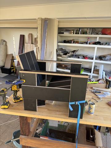 Assembly: clamps and a strap where Rietveld assumed a helper.