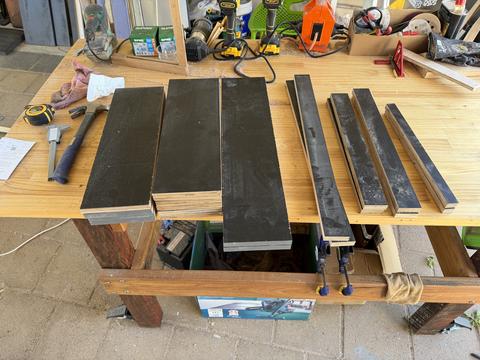 Seat boards and battens for the Rietveld Krate chair laid out against the 1934 sheet.