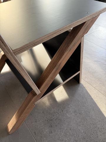 Detail under the seat of the keel chair where the hardwood keel, the front panel and the tie panel meet